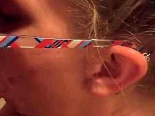 Amateur blonde streetwalker gives a blowjob to her client on the street