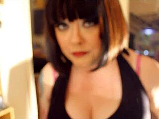 British smoking mistress Tina Suua teases with her cleavage while smoking