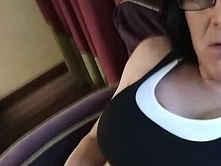 Gwenny indulges in intense masturbation, blending mature shemale charm with amateur maledom dominance.