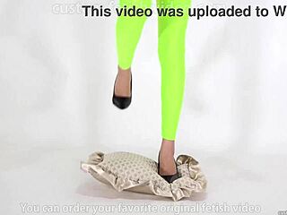 Beautiful woman steps on cushion in high heels