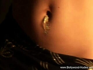 Indian beauty indulges in naughty act in exhibition