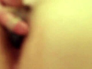 slut plugs her ass while masturbating deeply