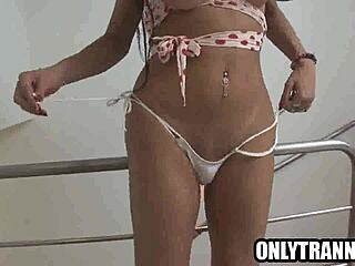 Hot brunette shemale strips naked and masturbates solo intensely