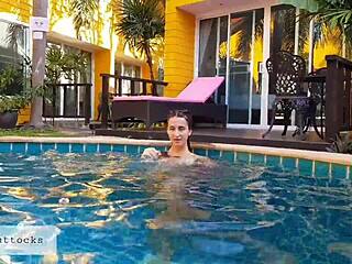 Naked teen masturbates in public pool