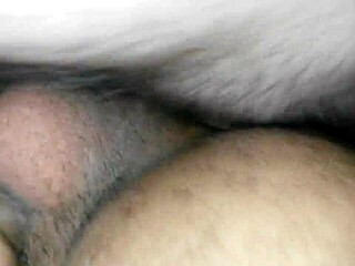 That hot milf is devouring the young guy's cock in this intense gay scene.