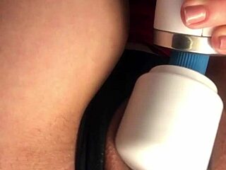 Cute teen slut fingers her pussy to squirting orgasm during solo masturbation. She cums hard on the bed.