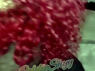 Redhead sucks big black dildo in Florida