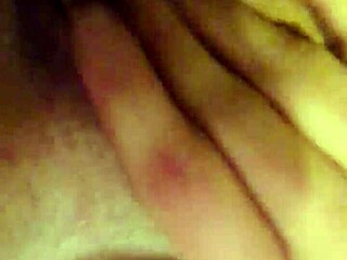 Tattooed Squirter Achieves Intense Orgasm Through Clit Stimulation and Cum Play.