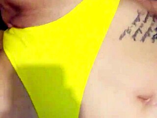 Tattooed Squirter Achieves Intense Orgasm Through Clit Stimulation and Cum Play.