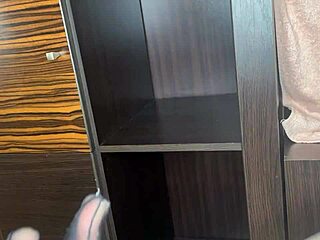 Intense closeup of foot in black stockings teasing anal on bed