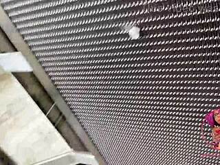 African Nerd Flashes Pierced Nipples In Public Elevator!