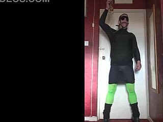 Old crossdresser masturbates with gag in mouth