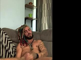 Tattooed gay guy masturbates in solo video