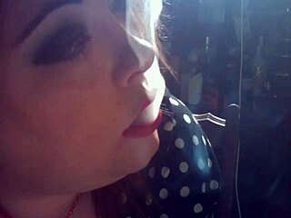 Fat chick smokes and flaunts her belly in kinky video