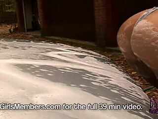 Sexy Dee Shows Big Tits While Washing Car Outdoors