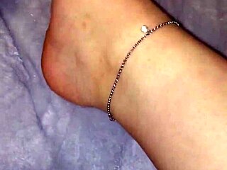 Moisturizing Feet With Lotion On Webcam