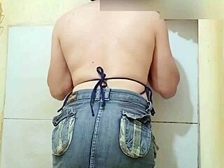 Feminine trans woman with dental issues in bikini