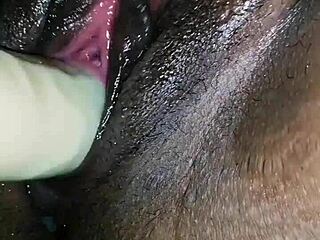 Latina girl licks and dives into her pussy before drilling it with a dildo