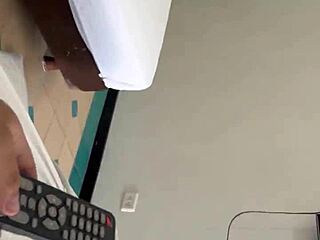 hotel receptionist changing sheets surprised by guest