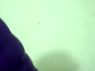 pissing in tight leggings inside the bathtub