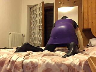 How LatexItaly poses in latex dress!