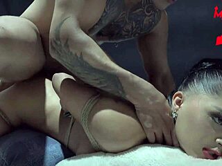 Shibari bound tight while her mouth gets filled with creamy cum