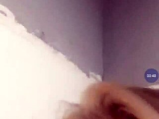 A sexy girl massages her big tits alone