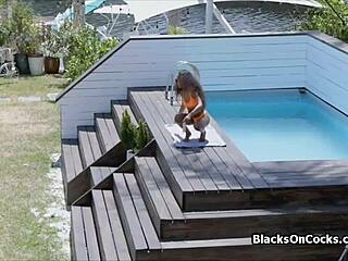 African American teenager in black bikini rides large penis in amateur interracial encounter