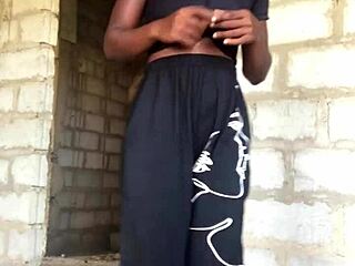 Crazy bitch performs strip tease with dirty talk. Trousers come down revealing nice gstring!