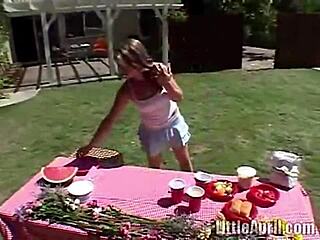 little april fingers her pussy at outdoor picnic, reaching orgasm with natural tits exposed