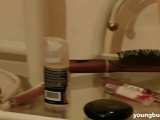 Busty young Jess teasing her shaved cunt with fingers