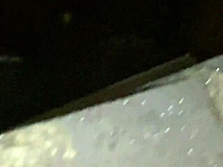 Mature blonde Cracky interacts with TV in reality show.