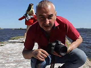 Exposed nude body on the public dock
