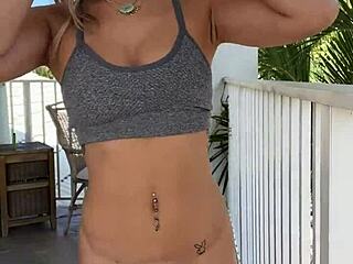 Luna Luxe masturbates sensually on sunny balcony