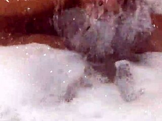 she moves her ass in the jacuzzi inviting daddy to join