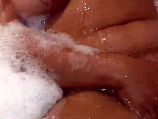 she moves her ass in the jacuzzi inviting daddy to join