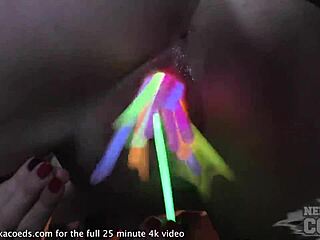 Babe Roxy Smokes Before Spreading Her Pussy Wide with Colorful Glowsticks on Sofa.