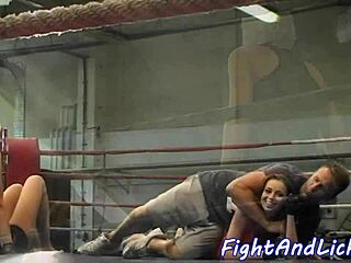 Bold sentence highlighting euro redhead dyke dominating wrestling opponent with close-up catfight moves.