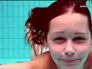 Nata swims with huge tits