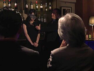 Japanese milf Kurea Hasumi removes her clothes in a group setting