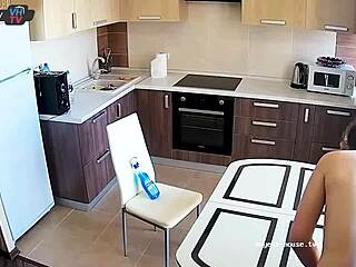 the big tits beauty cleans the kitchen topless