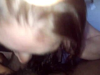 Sucking on big black cock