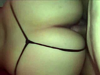 Sandy's voluptuous curves in a tight black thong