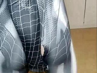Inked seductress explores her desires with Spider-Man sex toy