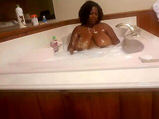Marliese Morgan, the stunning ebony BBW, indulges in a sensual soap session.