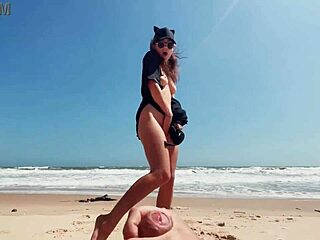 Young girl pleasures herself barefoot on a nude beach, while a guy masturbates and ejaculates nearby