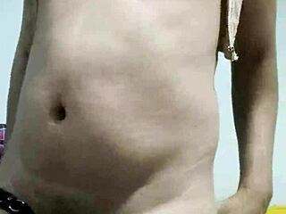 transvestite suggestively masturbates in sexy crossdressing