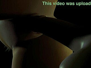 a beautiful plum girl rides a dildo in the dark, her big tits bouncing.