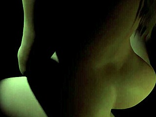 a beautiful plum girl rides a dildo in the dark, her big tits bouncing.