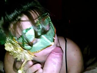 Milf in green mask teases thick cock with licks and sucks